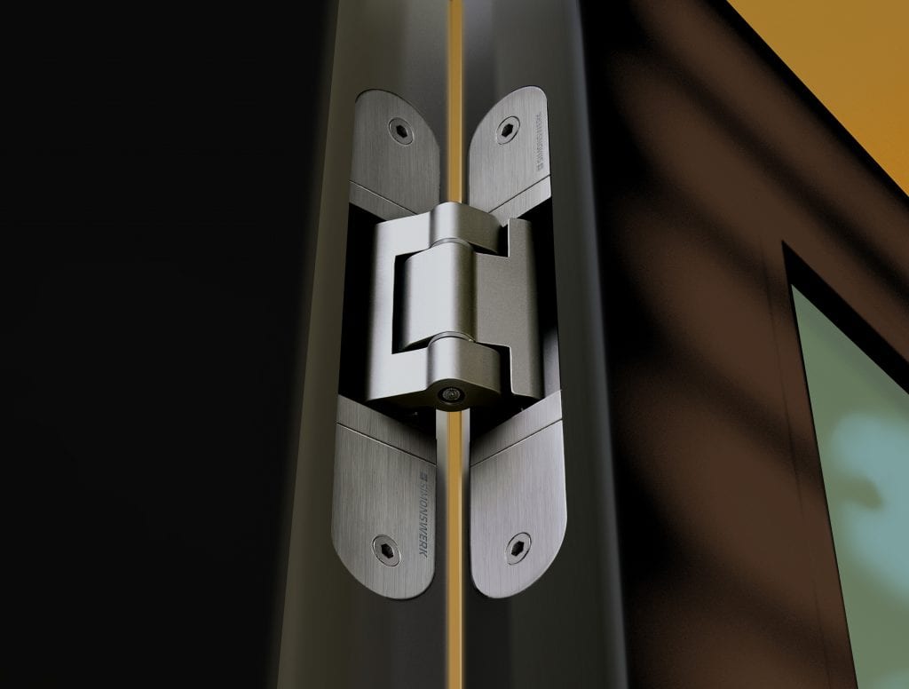 Close up of Tectus hinge installed on black door