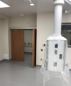 Pair of automatic wood doors in operating room