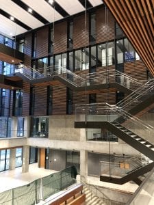 Ceiling-hung staircases in atrium at UTM Deerfield Hall
