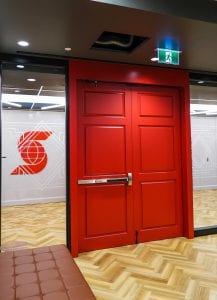 Red exit doors with Scotiabank logo in background