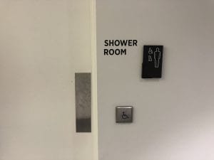 Shower room door with auto operator