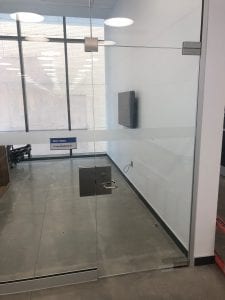 glass door with pivots and patch lock